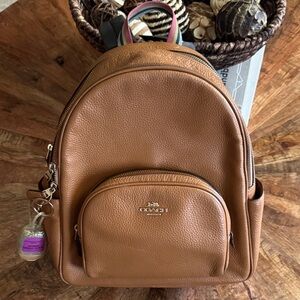 coach charlie pebble leather backpack f38288 military green Medium in Alora Collections Refined pebble leather Inside zip and multifunction pockets Double zip closure fabric lining Handle with 2 1/4 drop Outside zip pocket Adjustable shoulder straps 10 3/4 (L) x 12 1/2 (H) x 4 3/4 (W) Style No. Coach | Bags | Charlie